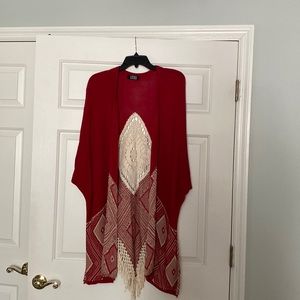 Poncho with short sleeve arm holes